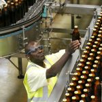 Global brewers push local beers to quench African palates