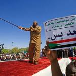 Bashir fights back as demonstrations persist