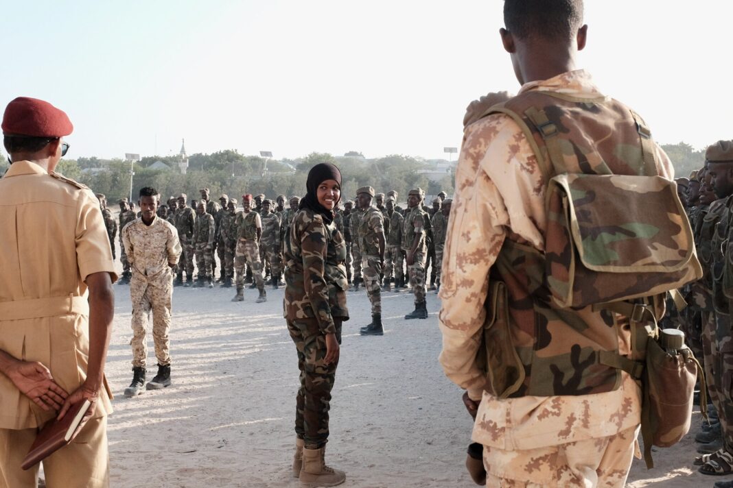 Lt. Col. Iman Elman, who is in charge of planning for the Somali National Army, overseeing troops before their deployment in anti-Shabab operations.Credit...Luca Bucken